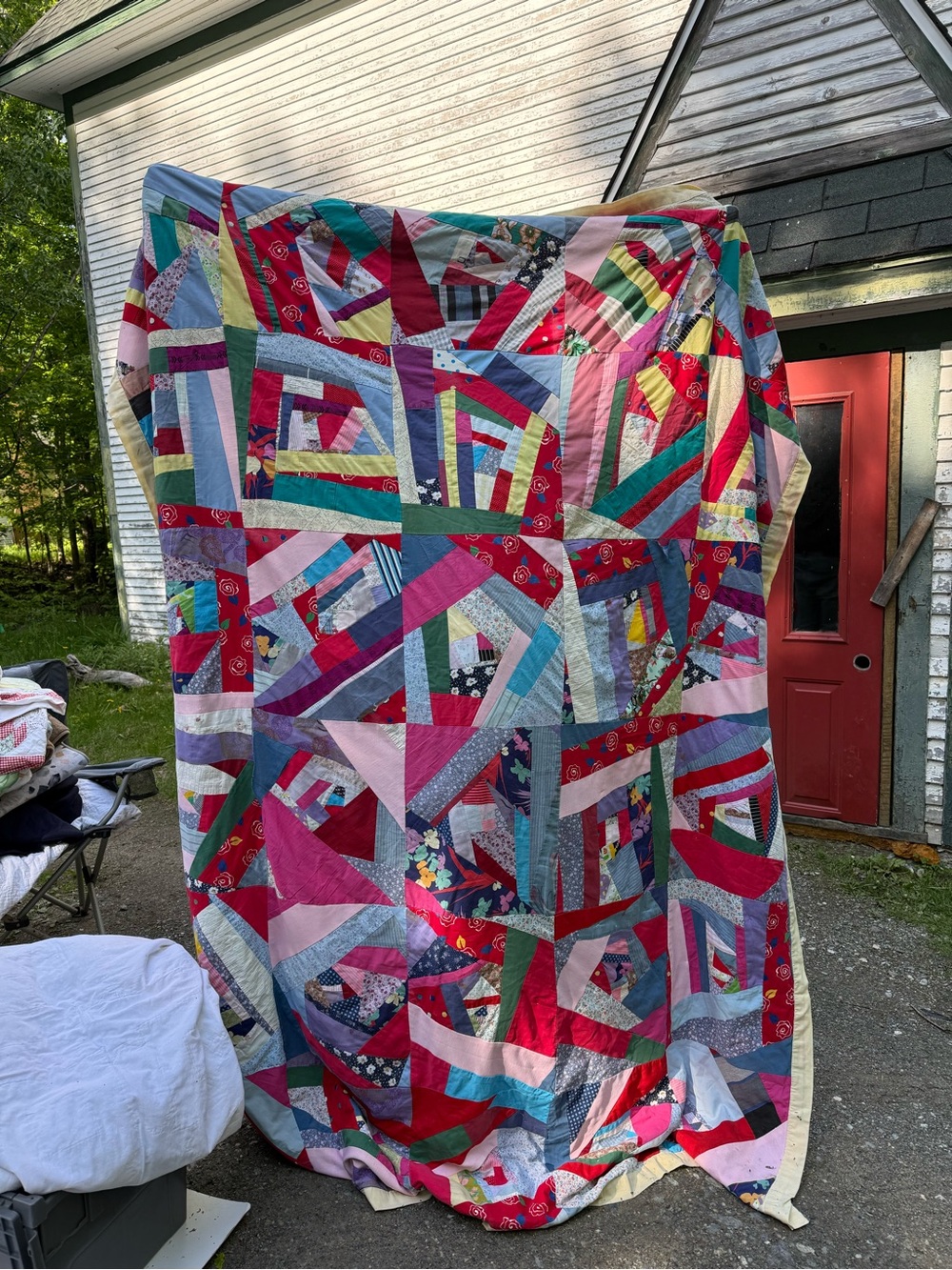 Handmade Multicolor Patchwork Quilt with Red and Pink Accents